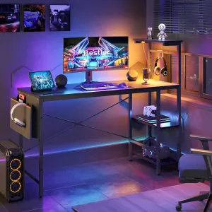 Bestier Gaming Desk with LED Lights, 51.3 Inch Computer Desk with 4 Tiers Reversible Shelves, Home Office Writing Desk with Side Storage Bag, Hooks and Height Adjustable Shelf (Black Grained)