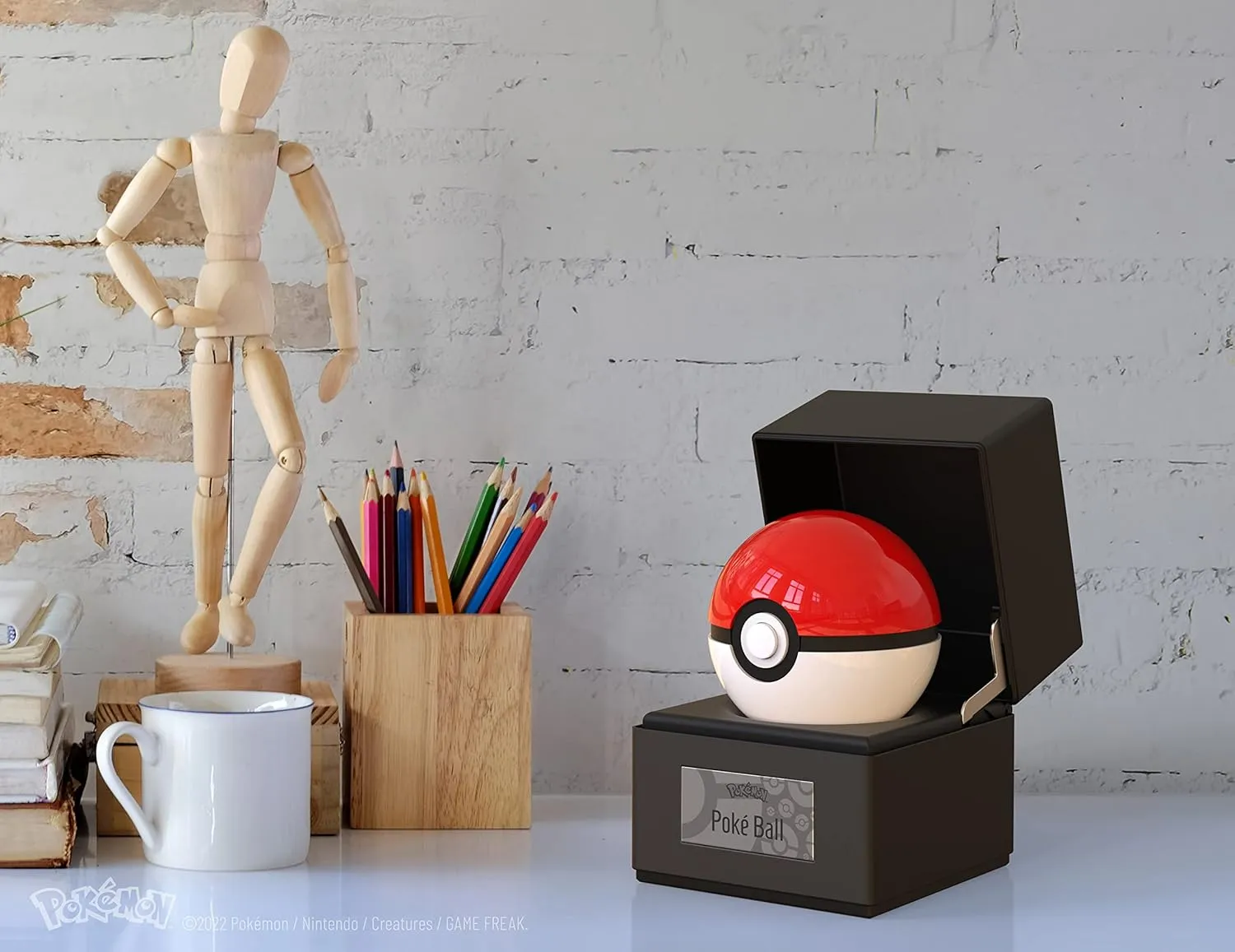 The Wand Company Original Poké Ball Authentic Replica - Realistic, Electronic, Die-Cast Poké Ball with Display Case Light Features – Officially Licensed by Pokémon